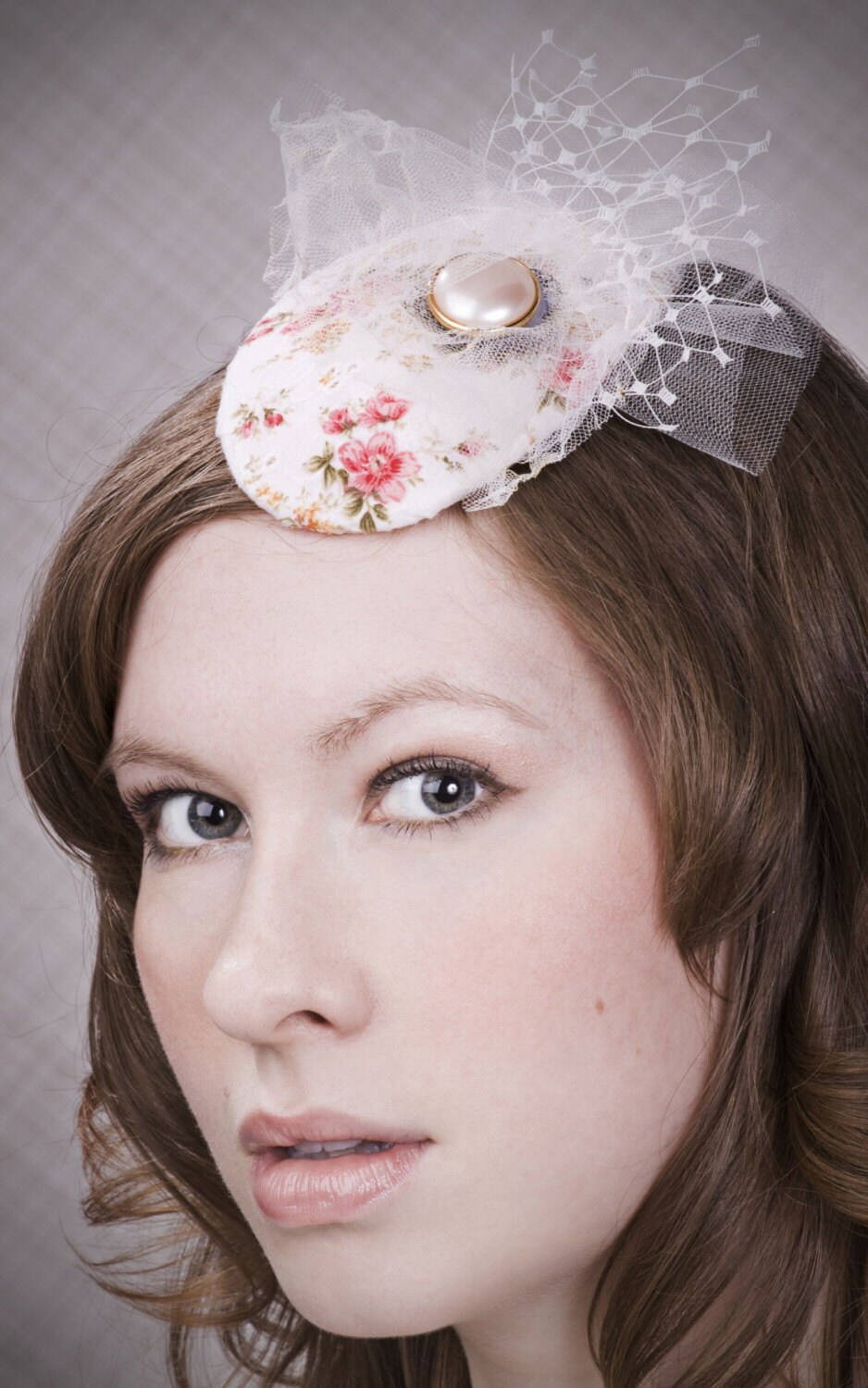 Hazel one of a kind teardrop cocktail hat by Love Charlie unique floral embroidery print with tattered veiling and vintage embellishments
