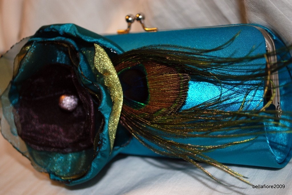 purple satin clutch. Bridesmaid Clutch Teal Satin clutch with Teal Purple and Olive Layered Handmade flower with Peacock Feather Accent. From bellafiore2009