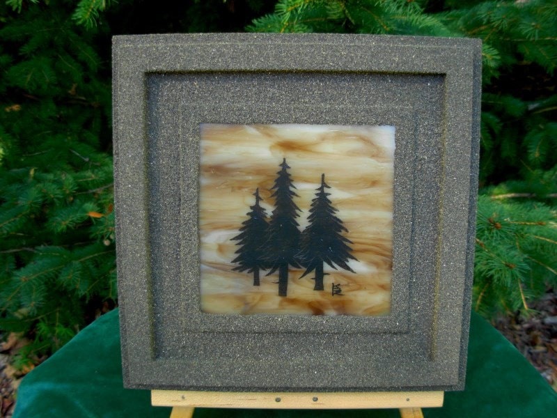 stained glass paint. Paint etched pine trees on brown swirl stained glass.