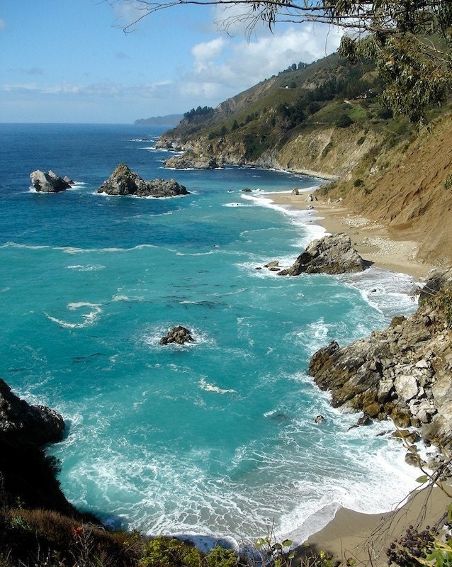 Turquoise waters and cliffs line the coast at Big Sur, California.