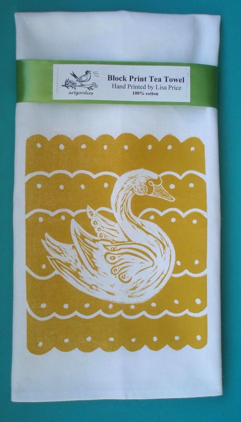 Headin up the hello yellow look is my latest artgoodies towel! Inspired by the swans at our family cottage its been hanging about my mind for some time. And one thing I love is a cute vintage scallop design! I am working on this ever changing display on my side buffet in my dining room. The color this month is yellow!  Ive gathered some of my personal collection as well as items in my vintage shop. A perfect way to enjoy a blast of color this July!  How can you get this look at your place??? Grab a swan towel and also check out links to the items to purchase!