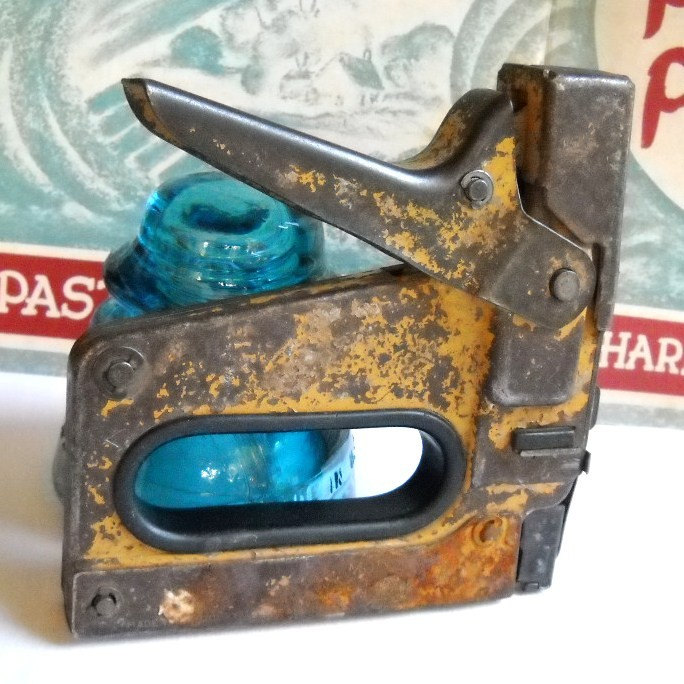 staple gun. stapler. tools. vintage