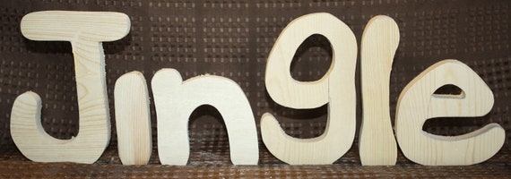 Jingle unfinished wood word to decorate you home for the season