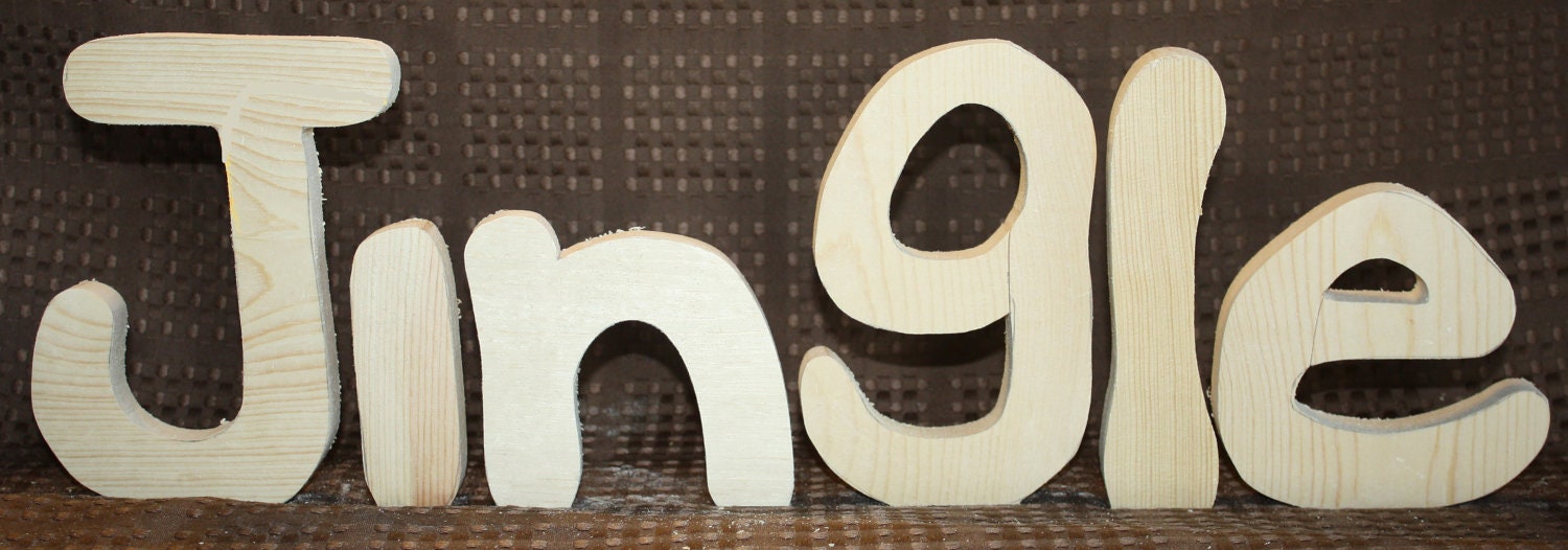 Jingle unfinished wood word to decorate you home for the season