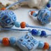 Necklace and ring, retro hippie in pastel blue, dark blue, gray blue and light brown - ocher