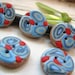 Round buttons in light blue, dark blue, turquoise, gray blue with red dots - set of six rustic buttons