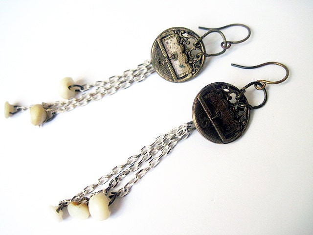 Mercy. Victorian Assemblage Earrings with Mop buttons and cut steel shanks.