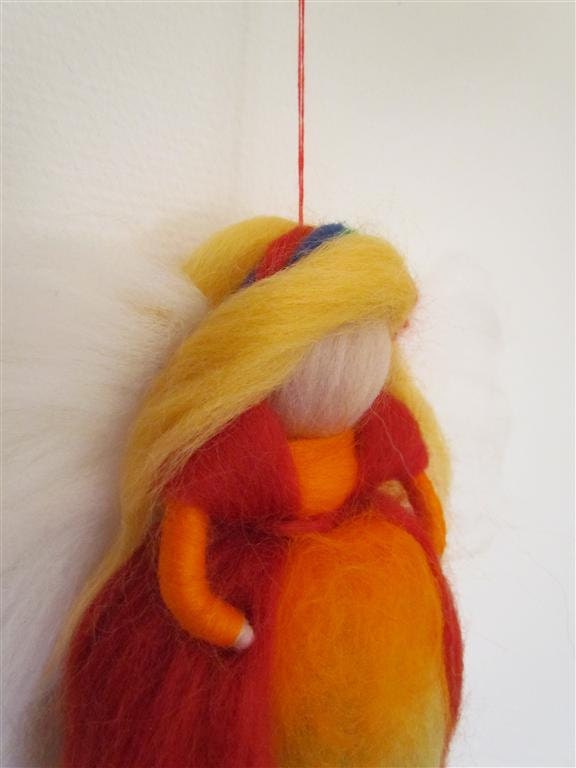 Sweet Rainbow  angel from wool in red/orange/yellow/green/blue and purple waldorf way made