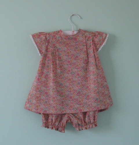Pretty liberty lawn baby dress with matching bloomers. Age 6 months.