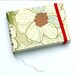 pocket notebook with grey flowers wallpaper
